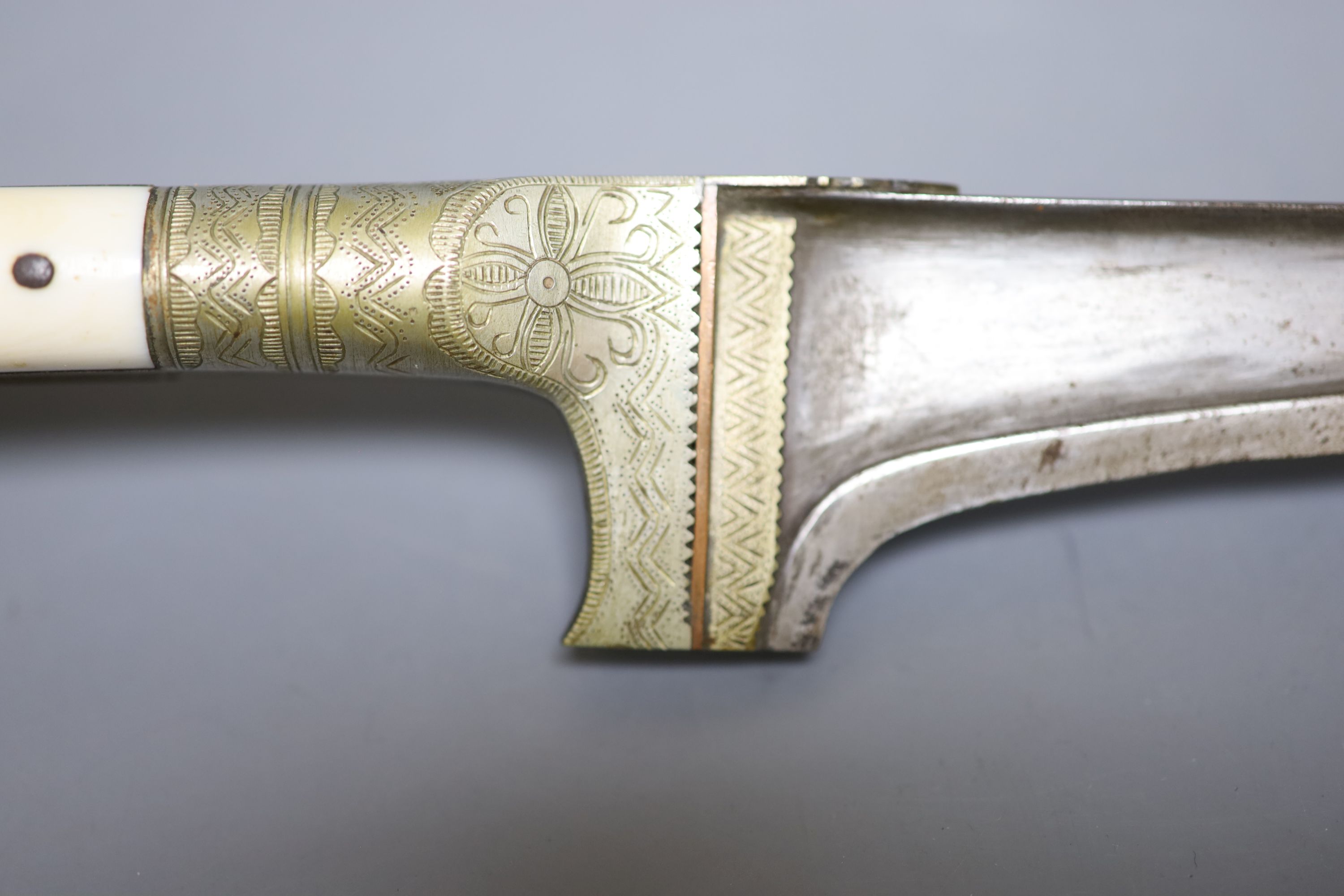 Two Indian army daggers, bone handles, one engraved 1939, with bone mounted handle, the other an ivory mounted handle